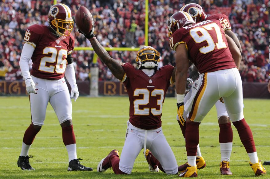 Washington Redskins cornerback DeAngelo Hall (23) celebrates his first quarter interception that set up the teams first touchdown in the first quarter at FedEx Field, Landover, Md., Nov. 18, 2012. (Preston Keres/Special to The Washington Times)