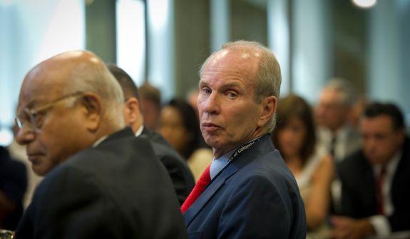 **FILE** Buddy Roogow, D.C. Lottery Executive Director, testifies June 29, 2011, at the Wilson Building in Washington, D.C., before a city council hearing regarding online poker in D.C. (Rod Lamkey Jr./The Washington Times)
