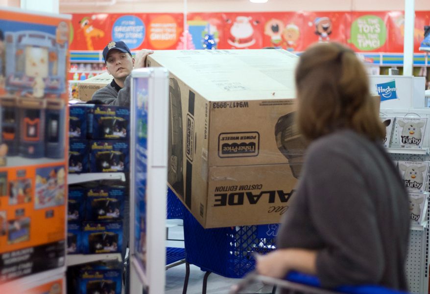 Shoppers look for bargains at Toys'R'Us on Thanksgiving Day, Fairfax, Va., Thursday, November 22, 2012. The stores, which opened nationwide at 8PM, will remain open for 24 hours for Black Friday. (Craig Bisacre/The Washington Times)