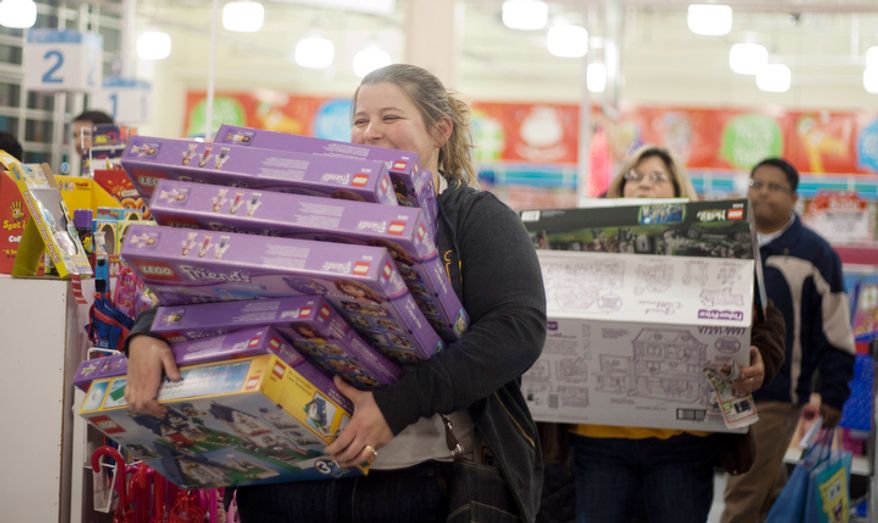 Shoppers look for bargains at Toys'R'Us on Thanksgiving Day, Fairfax, Va., Thursday, November 22, 2012. The stores, which opened nationwide at 8PM, will remain open for 24 hours for Black Friday. (Craig Bisacre/The Washington Times)