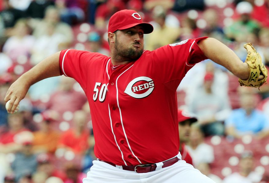 Cincinnati Reds relief pitcher Jonathan Broxton throws against the Milwaukee Brewers in the ninth inning of a baseball game, Thursday, Sept. 27, 2012, in Cincinnati. Broxton was the winning pitcher in their 2-1 victory. (AP Photo/Al Behrman)