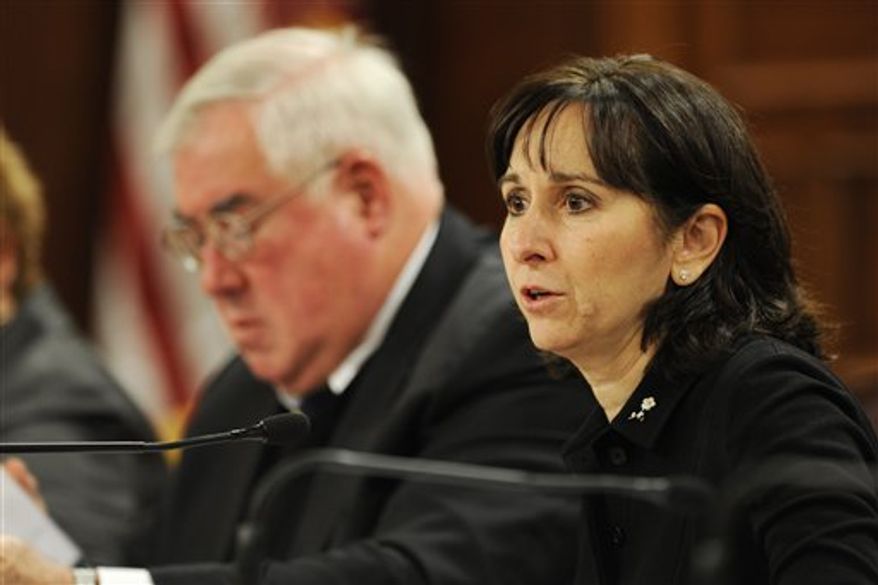 Dr. Cindy Christian, right, along with Bucks County District Attorney David Heckler, addresses the media during a news conference announcing the findings of a report from the Pennsylvania Task Force on Child Protection Tuesday, Nov. 27, 2012 at the capitol in Harrisburg, Pa. Pennsylvania should enact "sweeping" changes to state child abuse laws, the legislative commission concluded Tuesday after a year of study prompted by Jerry Sandusky's arrest on child molestation charges. (AP Photo/Bradley C Bower)