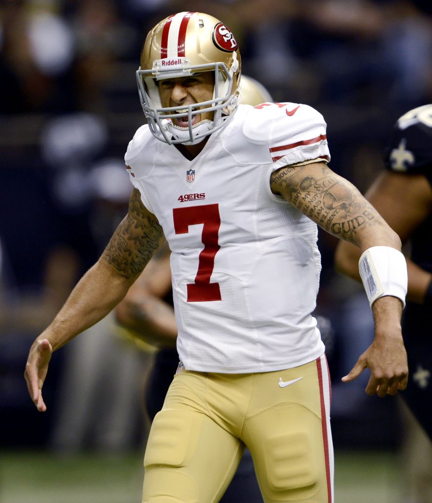 San Francisco 49ers quarterback Colin Kaepernick (7) celebrates his rushing touchdown in the first half of an NFL football game against the New Orleans Saints in New Orleans, Sunday, Nov. 25, 2012.The 49ers won 31-21. (AP Photo/Bill Feig)