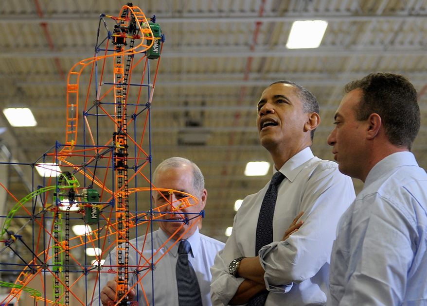 President Barack Obama looks over a rollercoaster with K'NEX Inventor Joel Glickman, left, and Rodon Group President and Chief Executive Officer Michael Araten, right, during a tour of the company in Hatfield, Pa. Friday, Nov. 30, 2012. The visit comes as the White House continues a week of public outreach efforts, while also attempting to negotiate a deal with congressional leaders. The Rodon Group manufactures over 95% of the parts for KÃŒNEX Brands toys. (AP Photo/Susan Walsh)