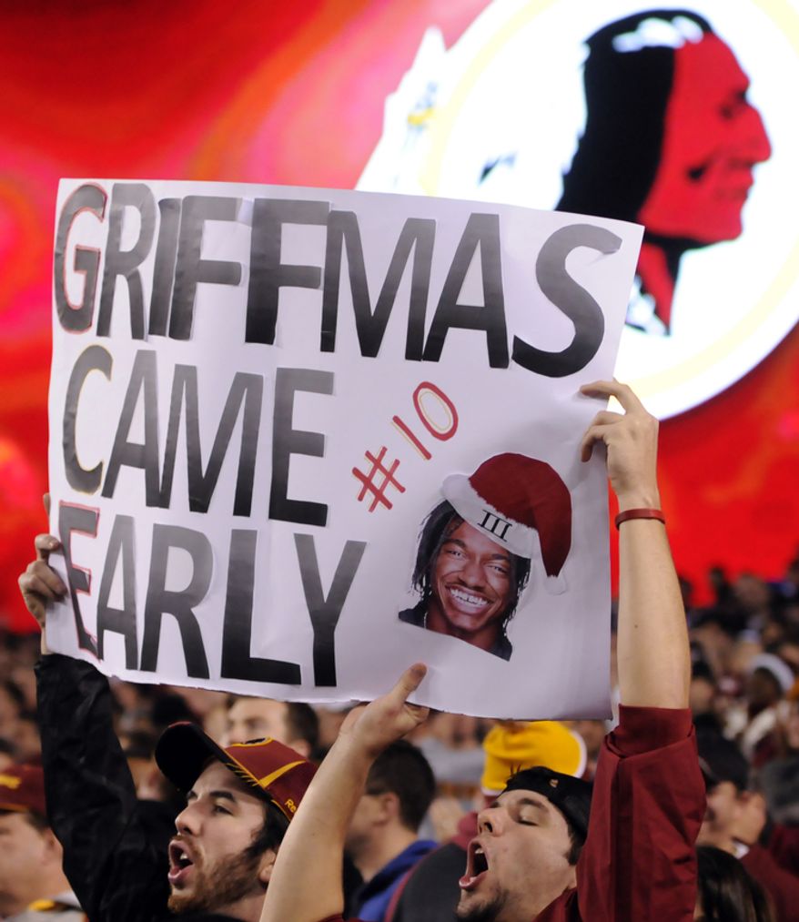 Fans celebrate their early Christmas present with a victory over the Giants at FedEx Field, Landover, Md., Dec. 3, 2012. (Preston Keres/Special to The Washington Times)
