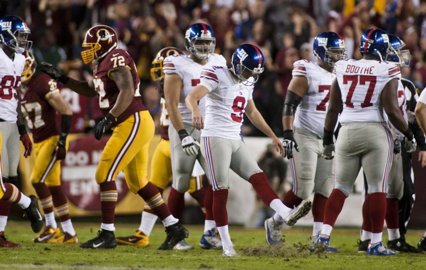New York Giants kicker Lawrence Tynes (9) reacts after missing a field goal in the first half against the Washington Redskins, Landover, Md., Monday, December 3, 2012. (Craig Bisacre/The Washington Times)