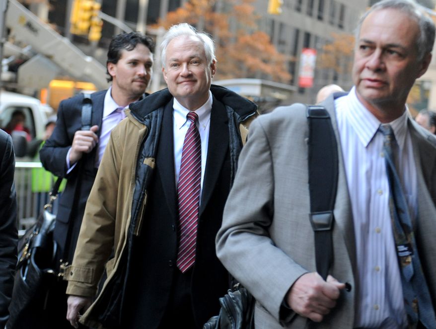NHL Players' Association executive director Donald Fehr, center, arrives for labor talks at NHL headquarters in New York with his brother, NHLPA counsel Steven Fehr, right, Wednesday, Nov. 21, 2012, in New York. (AP Photo/ Louis Lanzano)