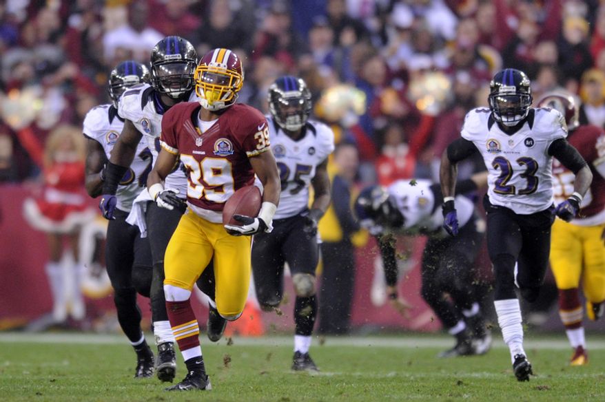 Washington Redskins cornerback Richard Crawford (39) returns an overtime punt 64 yards to the Baltimore 24 yard line at FedEx Field, Landover, Md., Dec. 9, 2012. (Preston Keres/Special to The Washington Times)