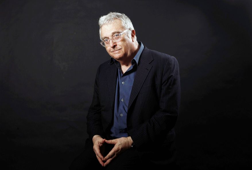 FILE - This Feb. 7, 2011 file photo shows musician Randy Newman posing after the Academy Award Nominees Luncheon in Beverly Hills, Calif. The eclectic group of rockers Rush and Heart, rappers Public Enemy, songwriter Randy Newman, "Queen of Disco" Donna Summer and bluesman Albert King will be inducted into the Rock and Roll Hall of Fame next April in Los Angeles. The inductees were announced Tuesday by 2012 inductee Flea of The Red Hot Chili Peppers at a news conference in Los Angeles. (AP Photo/Matt Sayles, file)