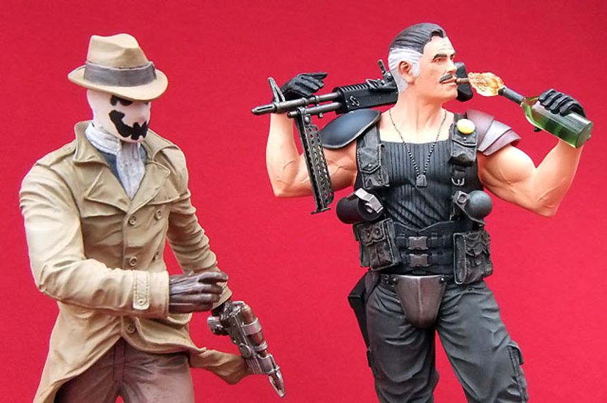 Gift ideas for the collector include DC Entertainment's Rorschach and The Comedian statues. (Photograph by Joseph Szadkowski)