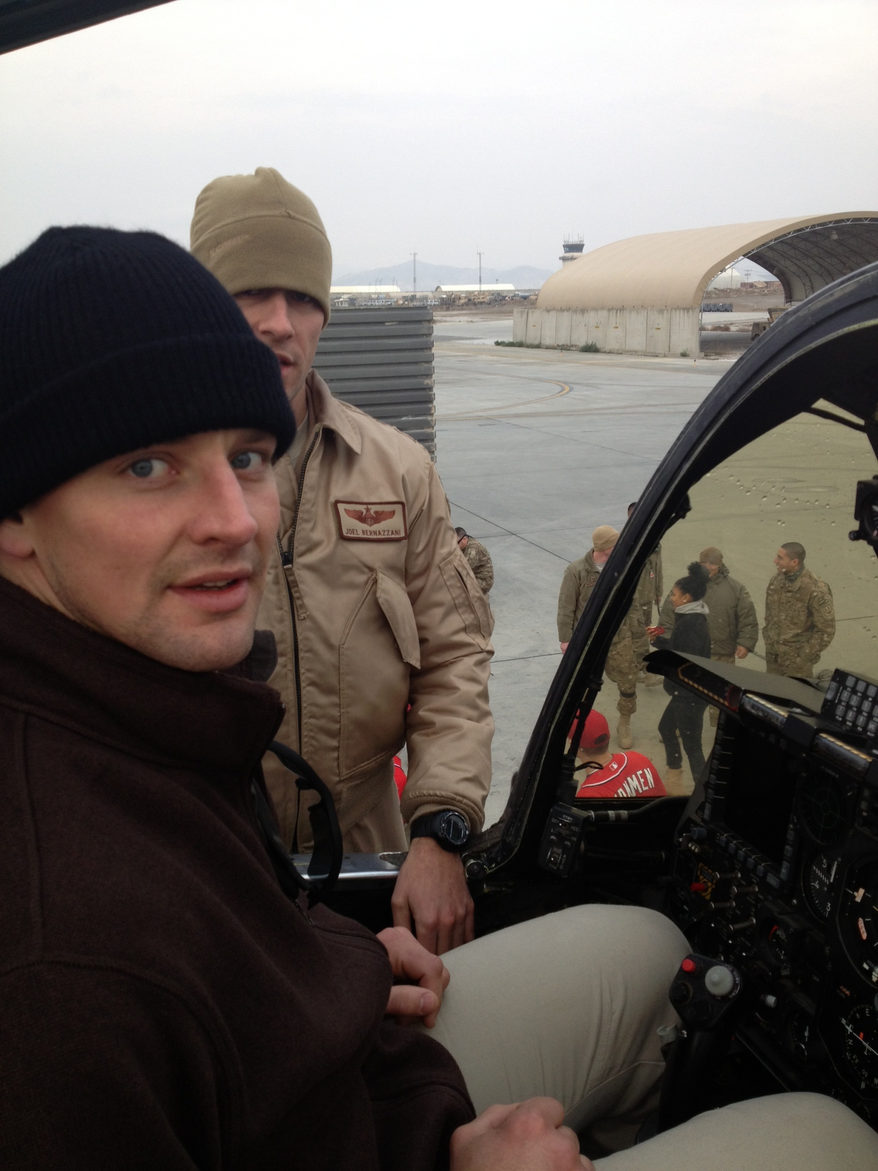 Matt Hendricks checks out a "Warthog" jet fighter during his USO Tour. (Photo courtesy Matt Hendricks)