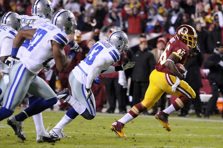 Washington Redskins running back Alfred Morris (46) turns runs past the Cowboy defense for a 17-yard touchdown in the second quarter at FedEx Field, Landover, Md., Dec. 30, 2012. (Preston Keres/Special to The Washington Times)