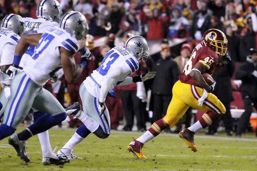 Washington Redskins running back Alfred Morris (46) turns runs past the Cowboy defense for a 17-yard touchdown in the second quarter at FedEx Field, Landover, Md., Dec. 30, 2012. (Preston Keres/Special to The Washington Times)