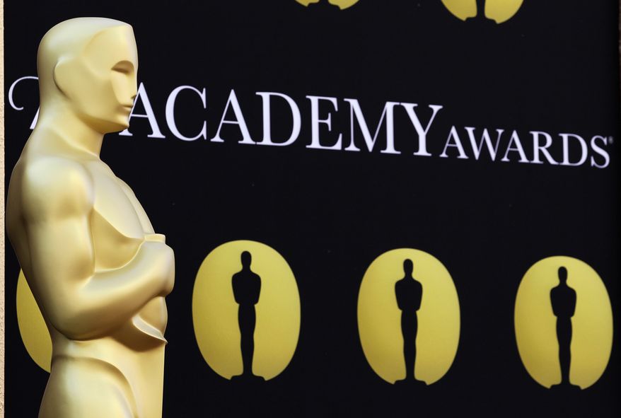 An Oscar statue stands on the red carpet outside the Kodak Theatre as preparations continued for the 82nd Academy Awards in Los Angeles in 2010. (AP Photo/Amy Sancetta)