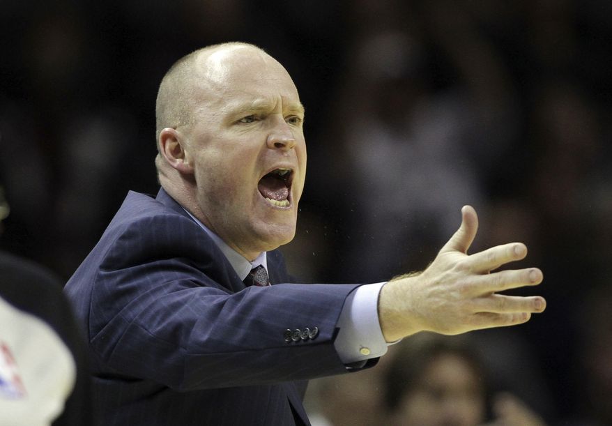 FILE - Milwaukee Buck head coach Scott Skiles argues a call during the fourth quarter of an NBA basketball game against the San Antonio Spurs, in this Dec. 5, 2012 file photo taken in San Antonio. Skiles and the Milwaukee Bucks have allegedly decided to part ways after just over four seasons together, ending a working relationship that seemed to been teetering on the brink for quite some time according to a person with knowledge of the move. (AP Photo/Eric Gay)