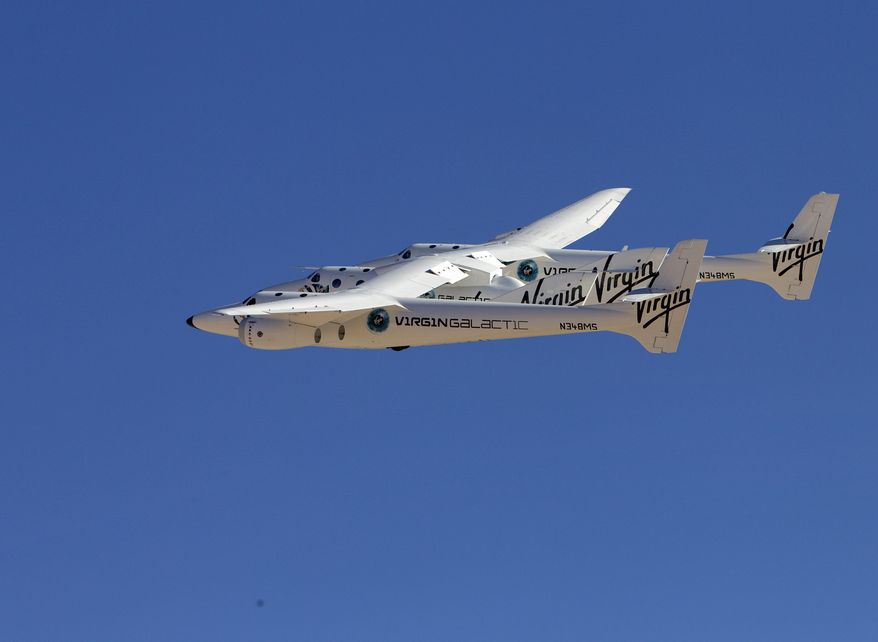 The civilian space travel industry is looking to states like New Mexico to expand legal protection if things go wrong. SpaceShipTwo is shown being carried to Spaceport America in New Mexico. (Associated Press)