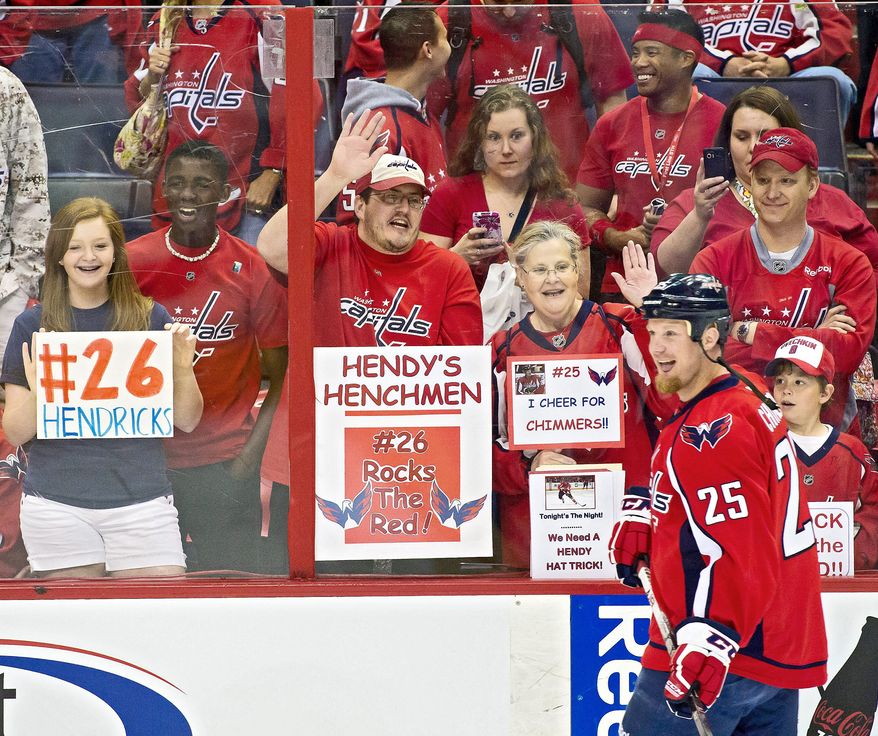 Fans cheered as Capitals left wing Jason Chimera (25) warmed up before Washington's playoff game against the New York Rangers on May 2 at Verizon Center. (Andrew Harnik/The Washington Times)