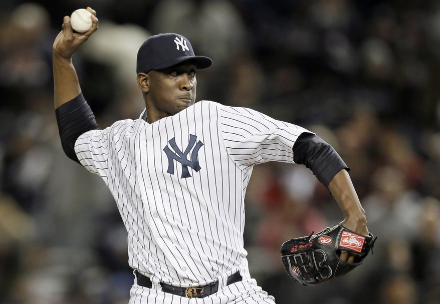 ** FILE ** In this Oct. 13, 2012, file photo, New York Yankees' pitcher Rafael Soriano throws in the tenth inning of Game 1 of baseball's American League championship series against the Detroit Tigers in New York. A person familiar with the negotiations says Soriano and the Washington Nationals are working to finalize a $28 million, two-year contract. The person spoke to The Associated Press on Tuesday, Jan. 15, 2013, on condition of anonymity because the deal had not been signed. (AP Photo/Matt Slocum)