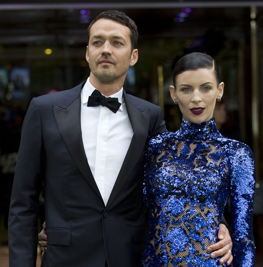 ** FILE ** Rupert Sanders, director of "Snow White and the Huntsman," and actress-model Liberty Ross, his wife, attend the world premiere of the film at a cinema in central London on Monday, May 14, 2012. (AP Photo/Alastair Grant, File)