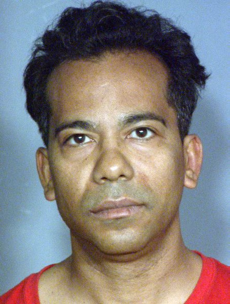 This photo released by the Las Vegas Metropolitan Police Department shows Nevada state Assembly member Steven Brooks after a Feb. 10, 2013, arrest on charges that he physically attacked a family member and grabbed for a police officer's weapon over the weekend. Brooks' previous court date for a felony allegation that he threatened Assembly Democratic Speaker Marilyn Kirkpatrick. Monday Feb. 11, 2013, was canceled after he was freed from jail on $4,000 bail for his weekend arrest. (AP Photo/Las Vegas Metropolitan Police) Department)