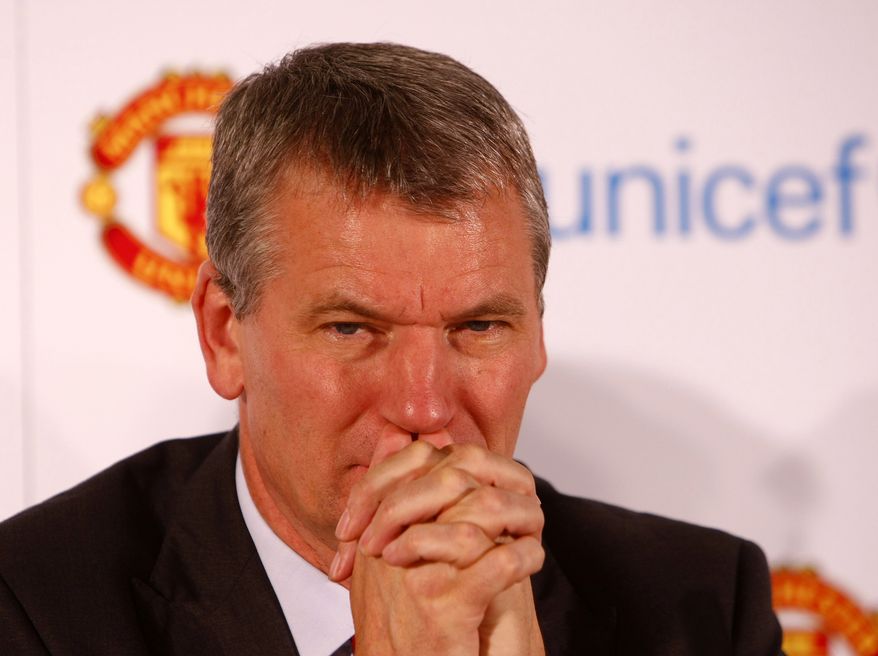 **FILE** Manchester United Chief Executive David Gill during a press conference to announce that 1million pounds ($1.59 million) of funding will be donated to UNICEF's global child survival work, Old Trafford, Manchester, England, Monday Oct. 18, 2010. UNICEF Ambassadors Ryan Giggs and Sir Alex Ferguson will sit on a panel with Manchester United Chief Executive David Gill, UNICEF UK Chief Executive David Bull and UNICEF Director of Fundraising Julie Weston. (AP Photo/Tim Hales)