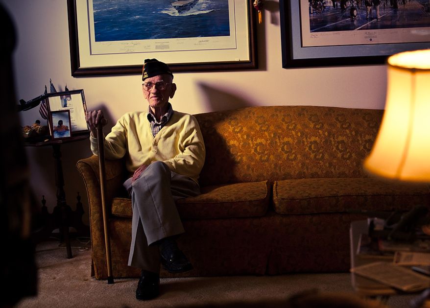 ** FILE ** Maj. USAF (Ret.) Thomas Griffin, 95, navigator of Crew 9 during the Doolittle Tokyo Raid, poses for a picture at his home, in Cincinnati, Ohio, Thursday, Feb, 9, 2012. (Andrew S. Geraci/The Washington Times)