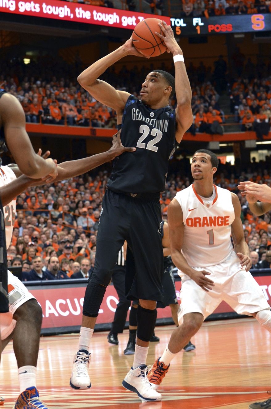 Georgetown's Otto Porter shoots against Syracuse during the first half in an NCAA college basketball game in Syracuse, N.Y., Saturday, Feb. 23, 2013. Georgetown won 57-46. (AP Photo/Kevin Rivoli)
