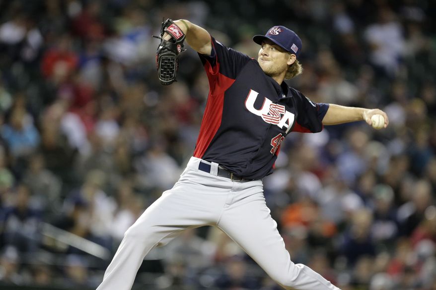 United States pitcher Ross Detwiler throws during a World Baseball Classic game against Italy Saturday, March 9, 2013, in Phoenix. (AP Photo/Charlie Riedel)