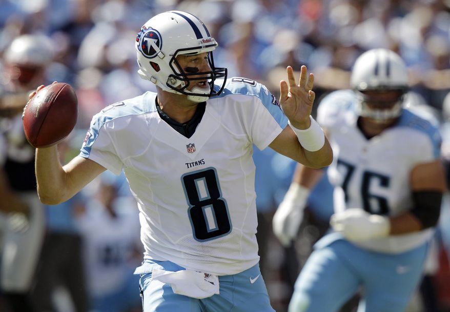 FILE - In this Sept. 9, 2012, file photo, Tennessee Titans quarterback Matt Hasselbeck throws a pass against the New England Patriots in the fourth quarter of an NFL football game in Nashville, Tenn. Less than 24 hours after being released by the Titans, the 37-year-old quarterback signed with division rival Indianapolis. Terms of the deal were not immediately available. It looks like a smart move for the Colts, who lost last year's backup, free agent Drew Stanton, to Arizona last week. (AP Photo/Wade Payne, File)