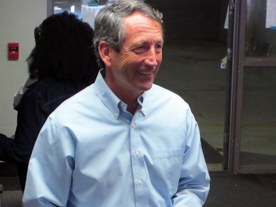 Former South Carolina Gov. Mark Sanford leaves the voting booth after voting at his precinct in Charleston, S.C., on Tuesday, April 2, 2013. (AP Photo/Bruce Smith)