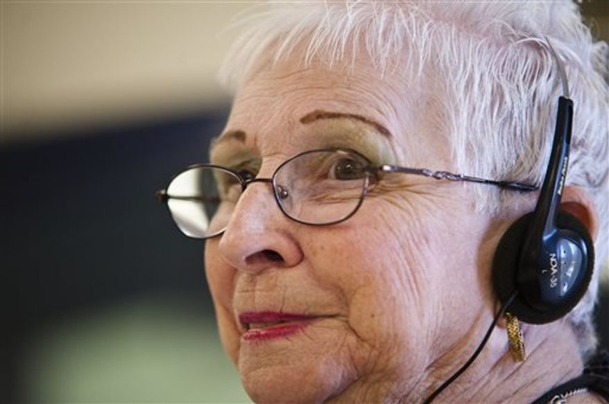 Evie Branan, 79, was in a vegetative state for years until one day when she bumped her head and was able to speak. Her first words were, "I want to go to a Bob Seger concert." Her wish came true Thursday. (AP Photo/The Flint Journal, Lauren Justice)