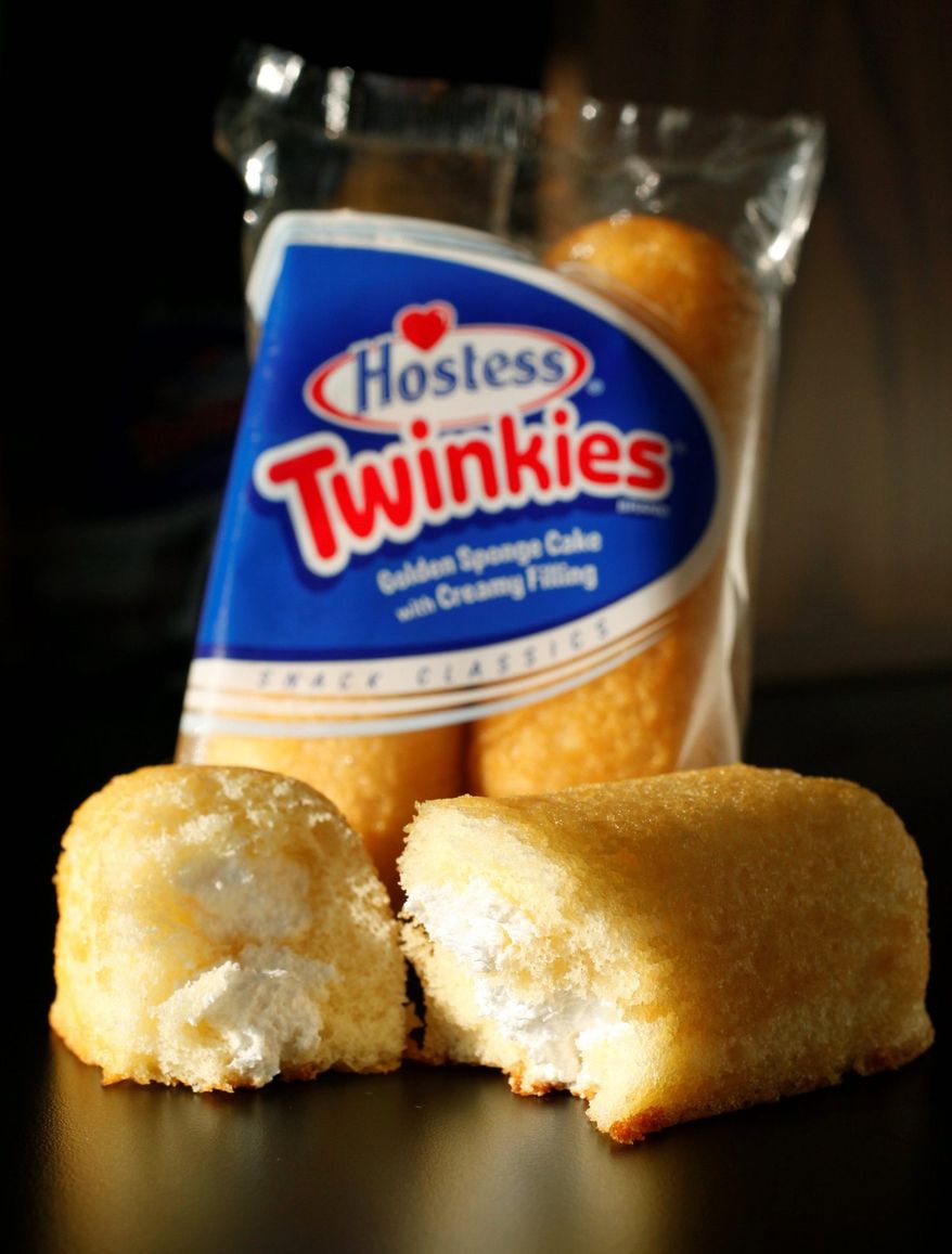 ** FILE ** This Jan. 10, 2012, file photo shows Hostess Twinkies in New York. Twinkies first came onto the scene in 1930 and contained real fruit until rationing during World War II led to the vanilla cream Twinkie. (AP Photo/Mark Lennihan, file)