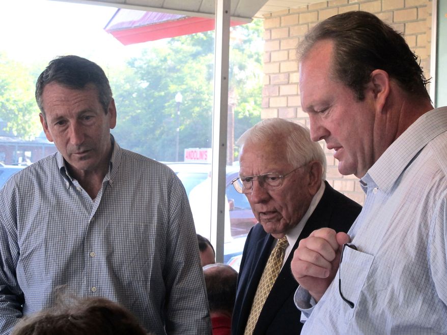 Former South Carolina Govs. Mark Sanford (left) and Jim Edwards and state Rep. Chip Limehouse, who lost to Sanford in the March primary for the state's open House seat, speak with voters during a campaign stop at a diner in Mount Pleasant, S.C., on May 6, 2012. Sanford faces Elizabeth Colbert Busch, the sister of comedian Stephen Colbert, in a special congressional election in the state's 1st District. (Associated Press)