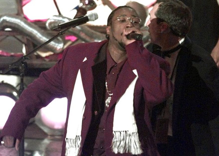 FILE - This Feb. 25, 1998 file photo shows O.D.B, Ol' Dirty Bastard of the Wu Tang Clan, whose legal name is Russell Jones, performing at Radio City Music Hall in New York. The culture that in the 1990s lost its brightest stars to gun violence has in recent years seen a series of notable rappers die of drug- and health-related causes. Since 2011, hip-pop pioneer Heavy D, singer and rap chorus specialist Nate Dogg and New York rapper Tim Dog all died of ailments in their 40s. Kriss Kross rapper Chris Kelly was found dead last week in Atlanta of a suspected drug overdose. Jones collapsed and died inside his studio on Nov. 13, 2004. (AP Photo/Mark Lennihan)