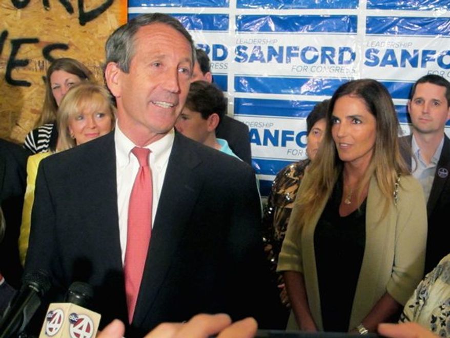 ** FILE ** Mark Sanford is headed back to Washington for this second turn in the House of Representatives, this time with fiancee Maria Belen Chapur at his side. (Associated Press)