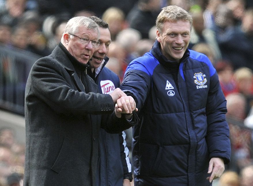 FILE - This is a April 22, 2012 file photo of Manchester United manager Sir Alex Ferguson, left, and Everton manager David Moyes during the Manchester United and Everton match at Old Trafford Manchester England . Everton said Thursday May 9, 2013 that its manager David Moyes is leaving the club at the end of the season and wants to replace Alex Ferguson at Manchester United. While United has not yet made an announcement on who will succeed Ferguson at Old Trafford, the statement from Everton clears the way for Moyes to be hired. (AP Photo/Martin Rickett/PA)