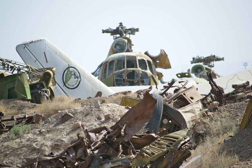 Known as the "Shindand boneyard," scraps of Soviet aircraft from the 1980s litter the landscape at Shindand Air Base, an Afghan military base in the westernmost province of Herat. (Kristina Wong/The Washington Times)