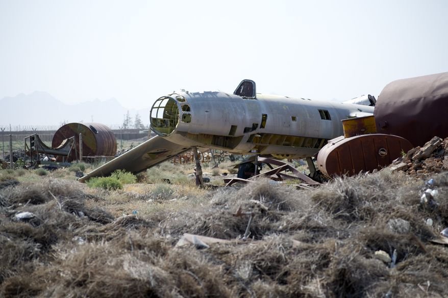 Known as the "Shindand boneyard," scraps of Soviet aircraft from the 1980s litter the landscape at Shindand Air Base, an Afghan military base in the westernmost province of Herat. (Kristina Wong/The Washington Times)