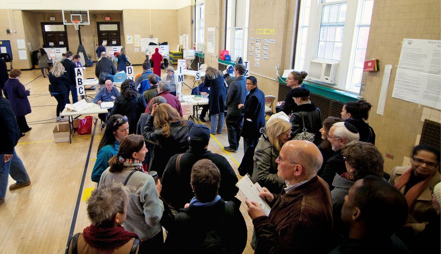 ** FILE ** Election Day bought out hordes of voters in Washington, D.C., but dozens of ballots were cast using the names of people who had moved to Prince George's County years ago. (The Washington Times)