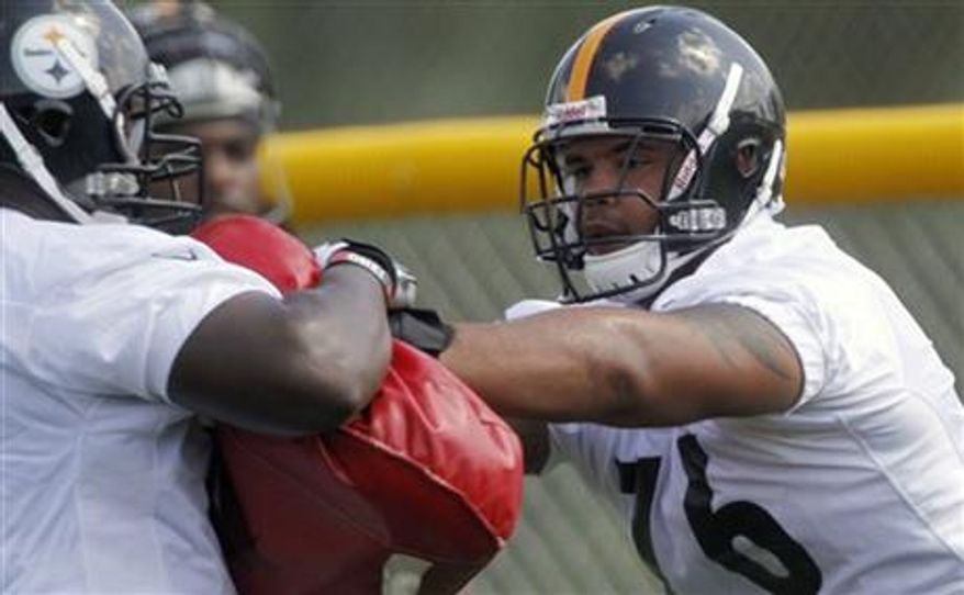 ** FILE ** Pittsburgh Steelers tackle Mike Adams (76) goes through blocking drills during practice at NFL football training camp in Latrobe, Pa., Friday, July 27, 2012. (AP Photo/Keith Srakocic)