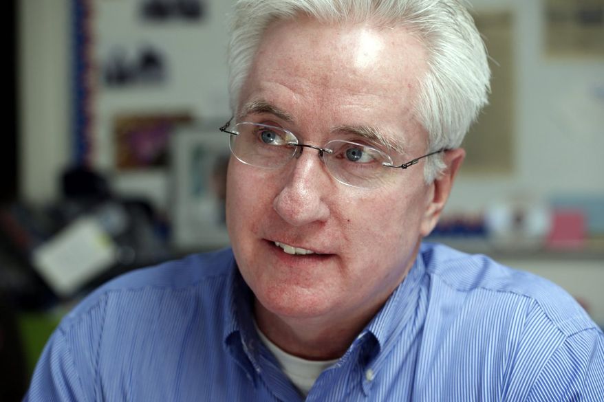 In this photo taken on May 24, 2013, Democratic State Senate President John Morse works at the Democratic Party offices in Colorado Springs, Colo., where Morse and his staff are planning their weekend strategy to encourage voters not to sign petitions for his recall. Gun-rights activists with support of the National Rifle Association are seeking Morse's ouster because of his support for new gun laws that restrict ammunition magazines and expand background checks to private gun sales. (AP Photo/Ed Andrieski)