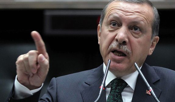 ** FILE ** Turkish Prime Minister Recep Tayyip Erdogan addresses lawmakers and supporters of his ruling Justice and Development Party at the parliament in Ankara, Turkey, on Tuesday, June 11, 2013. (AP Photo)