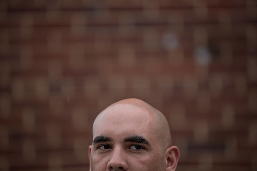 Faisal Sultani, Executive Chef & Owner of Clubhouse Cuisine, poses for a photograph outside of Nationals Ball Park in Washington, DC., Friday June 7, 2013. (Andrew S Geraci/The Washington Times)