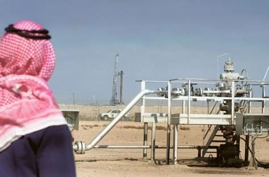 ** FILE ** The Ratqa oilfield in the northern Kuwaiti desert. (Associated Press)