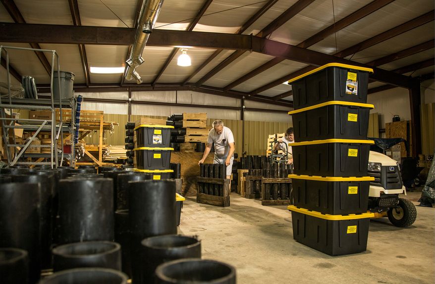 Raymond, 73, and Frances Branch, 65, prepare firing tubes for an upcoming event at Dominion Fireworks in Petersburg, Va. The company will provide 3,000 fireworks for the Fourth of July show on the Mall. (Andrew S. Geraci/The Washington Times)
