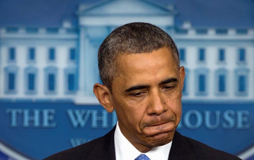 ** FILE ** President Barack Obama speaks in the Brady Press Briefing room of the White House in Washington, Friday, July 19, 2013, about the verdict in the Trayvon Martin case. (AP Photo/Carolyn Kaster)
