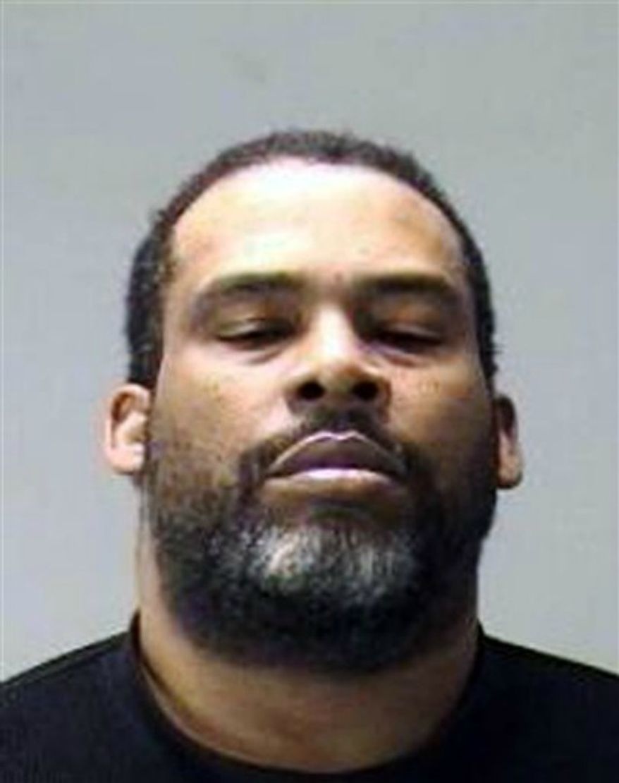Erbie Bowser is shown here after a previous arrest, was arrested on Wednesday night, Aug. 7, 2013, after the fatal shooting of four people in two Dallas-area homes. (AP Photo/Dallas County Sheriff's Office)
