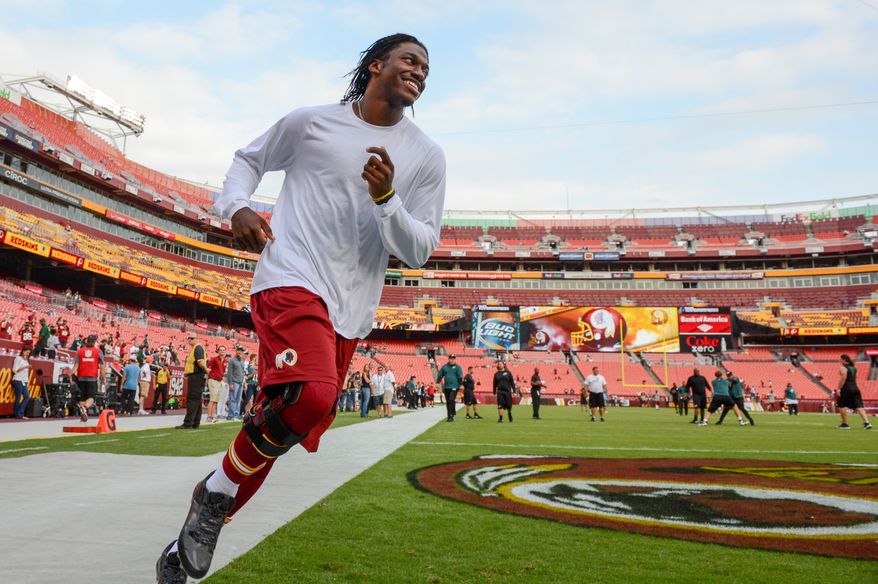 Washington Redskins quarterback Robert Griffin III (10) warms up before the Washington Redskins play the Philadelphia Eagles in Monday Night NFL football at FedExField, Landover, Md., Monday, September 9, 2013. (Andrew Harnik/The Washington Times)
