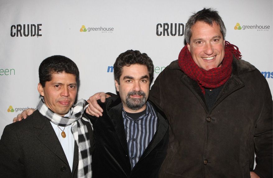 Attorney Pablo Fajardo, Joe Berlinger and attorney Steven Donziger attend the Sundance Greenhouse after-party for Crude, Sunday, Jan. 18, 2009 in Park City, Utah. (AP Photo/Shea Walsh)