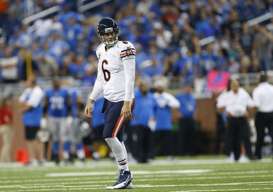 Chicago Bears quarterback Jay Cutler walks back to the bench during the fourth quarter of an NFL football game against the Detroit Lions in Detroit, Sunday, Sept. 29, 2013. The Lions won 40-32. (AP Photo/Paul Sancya)